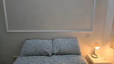 Cama o camas de una habitación en Mini Apartamento Lovely Chueca
