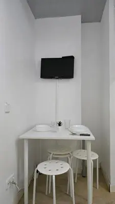Una televisión o centro de entretenimiento en Mini Apartamento Lovely Chueca