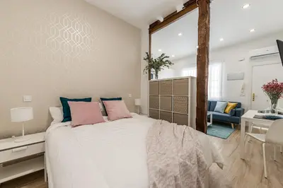 Cama o camas de una habitación en Waou Atocha III - Alquiler Corta Duración