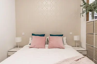 Cama o camas de una habitación en Waou Atocha III - Alquiler Corta Duración
