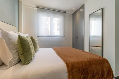 Cama o camas de una habitación en Cozy 2-Bed Apartment for 3 in La Latina
