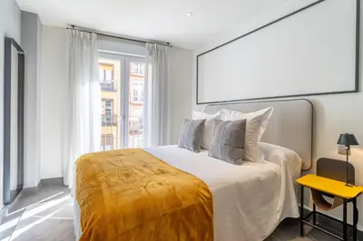 Cama o camas de una habitación en Modern 2-Person Studio in Madrid Center