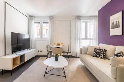 Una televisión o centro de entretenimiento en Spectacular Duplex Penthouse in La Latina Madrid