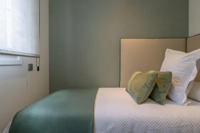 Cama o camas de una habitación en Fresh 2-Bed Apartment for 3 in La Latina