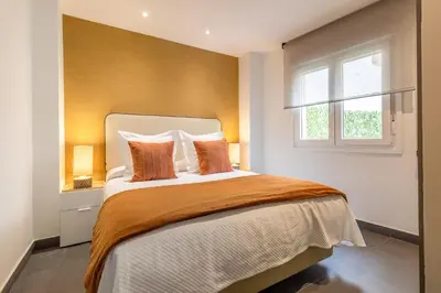 Cama o camas de una habitación en Modern 1-Bed Apartment with Private Terrace