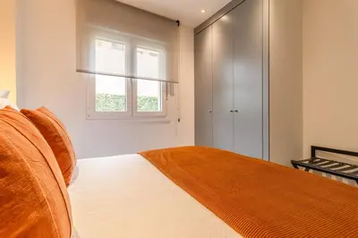 Cama o camas de una habitación en Modern 1-Bed Apartment with Private Terrace