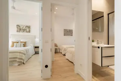 Cama o camas de una habitación en Cozy 2-Bed Apartment for 4 in Central Madrid