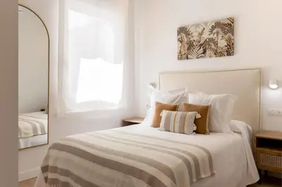 Cama o camas de una habitación en Cozy 2-Bed Apartment for 4 in Central Madrid