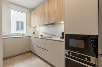 Una cocina o zona de cocina en Cozy 2-Bed Apartment for 4 in Central Madrid