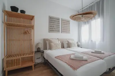 Cama o camas de una habitación en Amazing apartment-3Bedrooms 3Bathrooms-Lavapiés