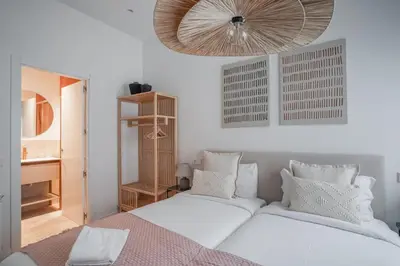 Cama o camas de una habitación en Amazing apartment-3Bedrooms 3Bathrooms-Lavapiés
