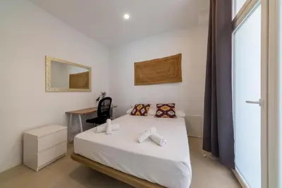 Cama o camas de una habitación en Modern and Cozy - 2 Bedrooms 1 Bathroom - Lavapiés