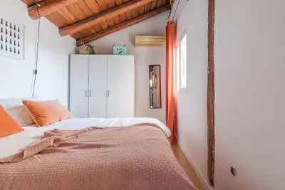 Cama o camas de una habitación en Maravilloso estudio en Chamberi. Metro Quevedo