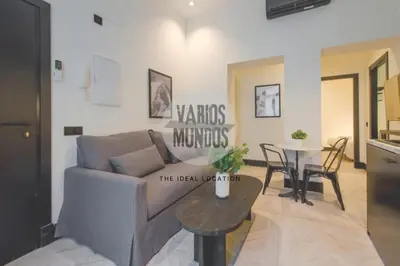 Zona de estar de Iconic Apt en plena Plaza del Carmen para 4pax E3