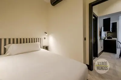 Cama o camas de una habitación en Iconic Apt en plena Plaza del Carmen para 4pax E3