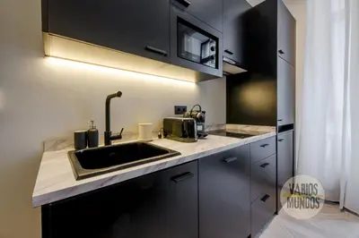 Una cocina o zona de cocina en Iconic Apt en plena Plaza del Carmen para 4pax E3