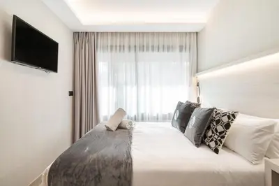 Cama o camas de una habitación en Dobo Madrid SB20