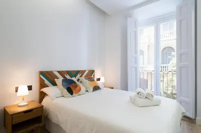 Cama o camas de una habitación en Chueca Hortaleza 12Pax 5 Bedrooms 5 Baths