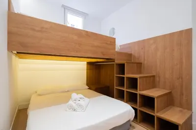 Cama o camas de una habitación en Chueca Hortaleza 12Pax 5 Bedrooms 5 Baths