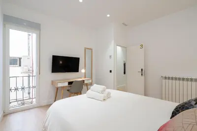 Cama o camas de una habitación en Chueca Hortaleza 12Pax 5 Bedrooms 5 Baths