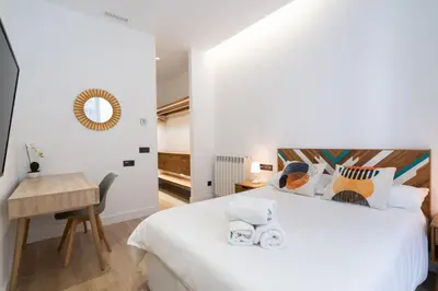 Cama o camas de una habitación en Chueca Hortaleza 12Pax 5 Bedrooms 5 Baths