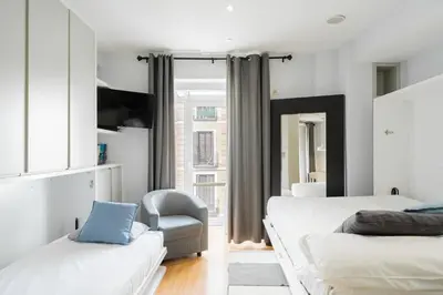 Cama o camas de una habitación en Apartamento con BALCÓN a CALLE MAYOR Ideal PAREJAS