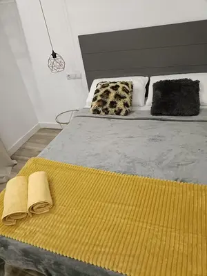 Cama o camas de una habitación en Habitaciones plaza payor