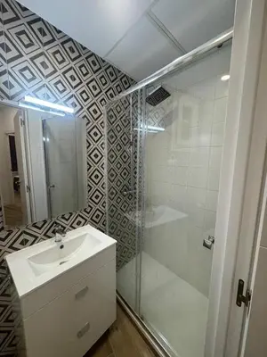 Un baño de Habitaciones plaza payor