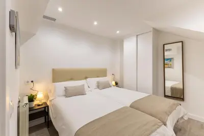 Cama o camas de una habitación en Apartamento en la Plaza Olavide