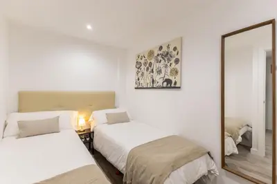 Cama o camas de una habitación en Apartamento en la Plaza Olavide