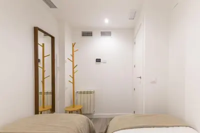 Cama o camas de una habitación en Apartamento en la Plaza Olavide