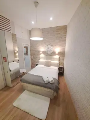 Cama o camas de una habitación en Cosy apartamento en La Latina