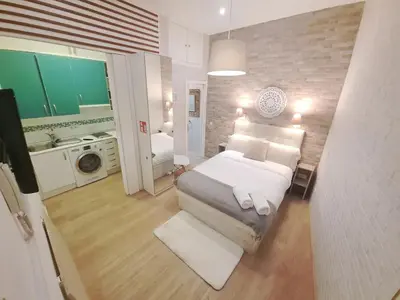 Cama o camas de una habitación en Cosy apartamento en La Latina
