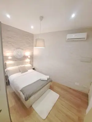 Cama o camas de una habitación en Cosy apartamento en La Latina