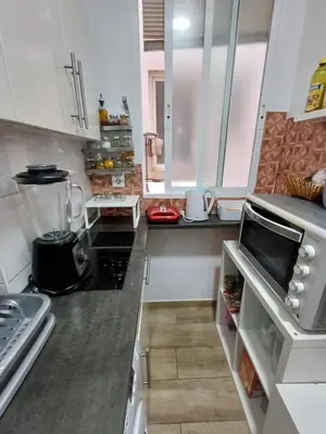 Una cocina o zona de cocina en room en madrid pacifico