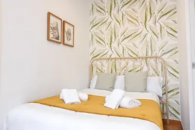 Cama o camas de una habitación en For You Rentals Vive la vida madrileña en piso temporal 2 habitaciones CER832