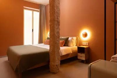 Cama o camas de una habitación en The Loft House Madrid