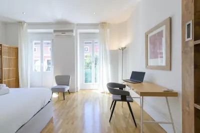 Cama o camas de una habitación en GuestReady - Madrid Urban Retreat