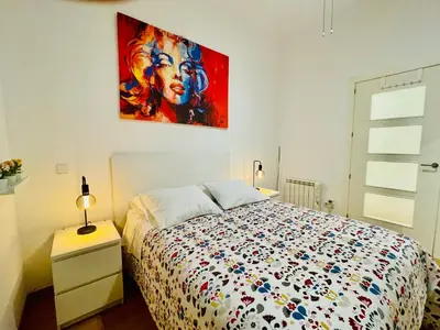 Cama o camas de una habitación en APARTAMENTO MUY CENTRICO - entre PALACIO REAL Y PLAZA MAYOR