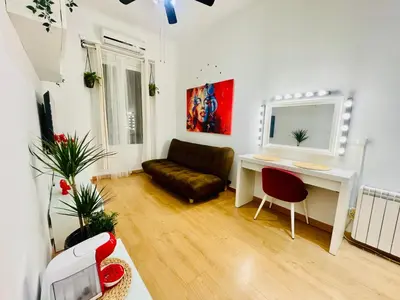 Una televisión o centro de entretenimiento en APARTAMENTO MUY CENTRICO - entre PALACIO REAL Y PLAZA MAYOR