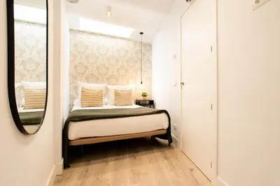 Cama o camas de una habitación en Apartamento Silvela Duplex en Madrid