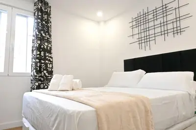Cama o camas de una habitación en For You Rentals Amplia Casa temporal Madrid de 3 Dormitorios M VIL45