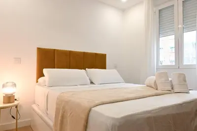 Cama o camas de una habitación en For You Rentals Amplia Casa temporal Madrid de 3 Dormitorios M VIL45