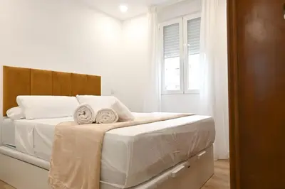 Cama o camas de una habitación en For You Rentals Amplia Casa temporal Madrid de 3 Dormitorios M VIL45
