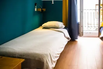 Cama o camas de una habitación en Onefam Sungate