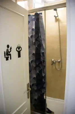 Un baño de Onefam Sungate