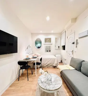 Una televisión o centro de entretenimiento en Apartamento Centro de Madrid