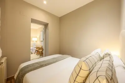 Cama o camas de una habitación en Amazinn Stay Madrid Chamberí