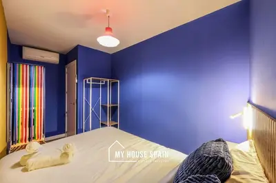 Cama o camas de una habitación en MyHouseSpain - Moderno piso junto a Gran Vía