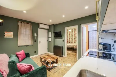 Una cocina o zona de cocina en MyHouseSpain - Moderno piso junto a Gran Vía